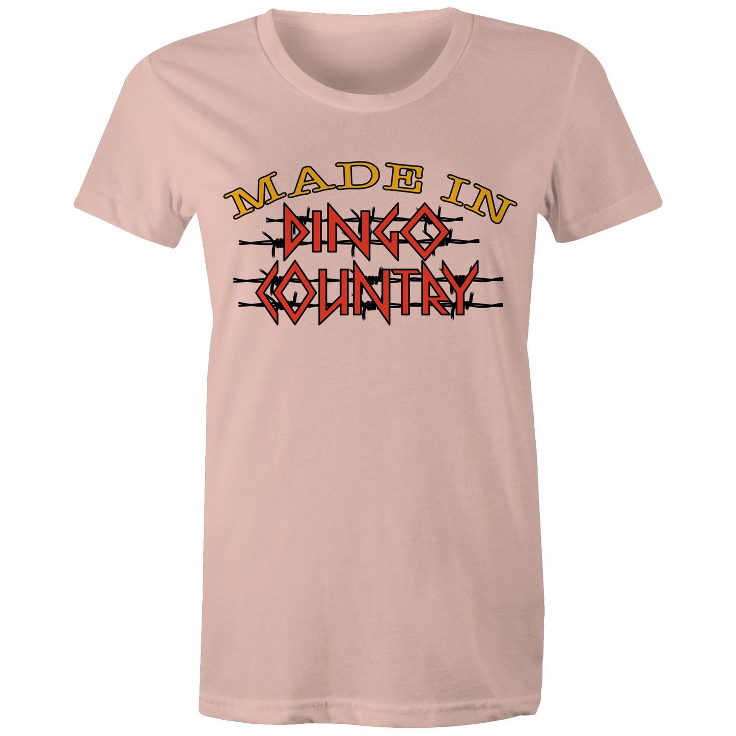 Comfortable pale pink Women's Maple Tee with 'Made in Dingo Country' graphic in bold yellow and red, capturing the adventurous Aussie spirit