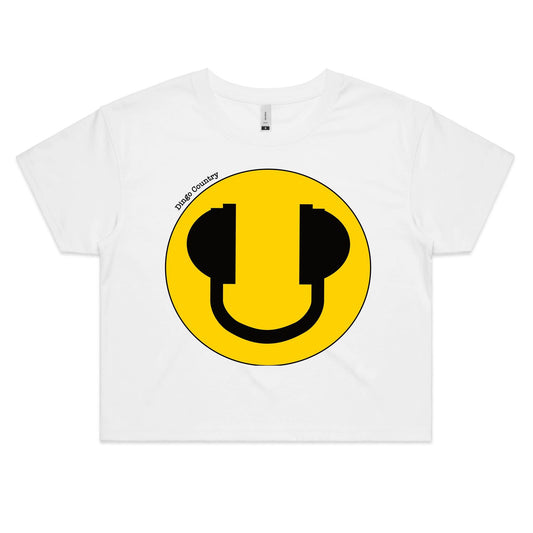 Chic white women's crop tee featuring a central yellow smiley face with black headphone accents, available in black and white, from Dingo Country.